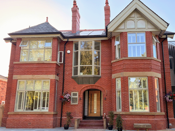 outside image of period property in manchester with tier on tier shutters